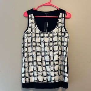 Daisy Fuentes black and white shirt